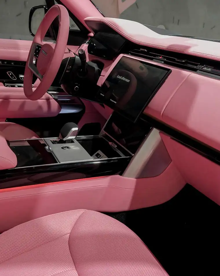Range Rover with a full blush pink interior transformation and Forgiato wheels