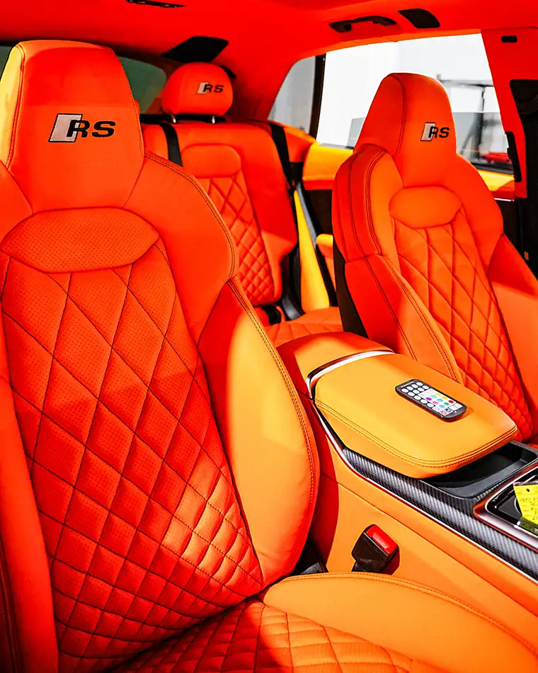 Custom stitched leather interior with ambient lighting